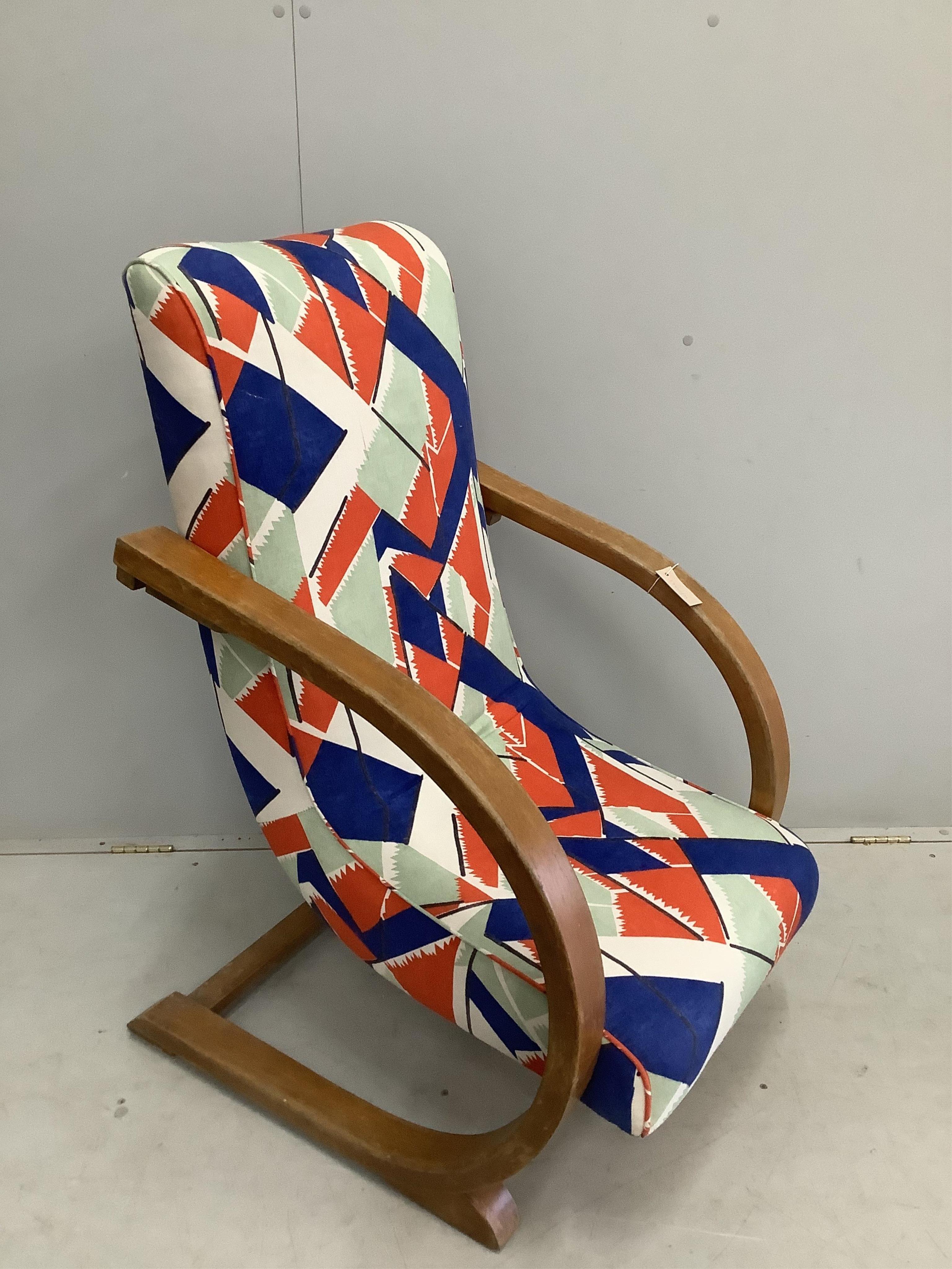 A mid century bentwood cantilever rocking chair, width 63cm, depth 80cm, height 102cm